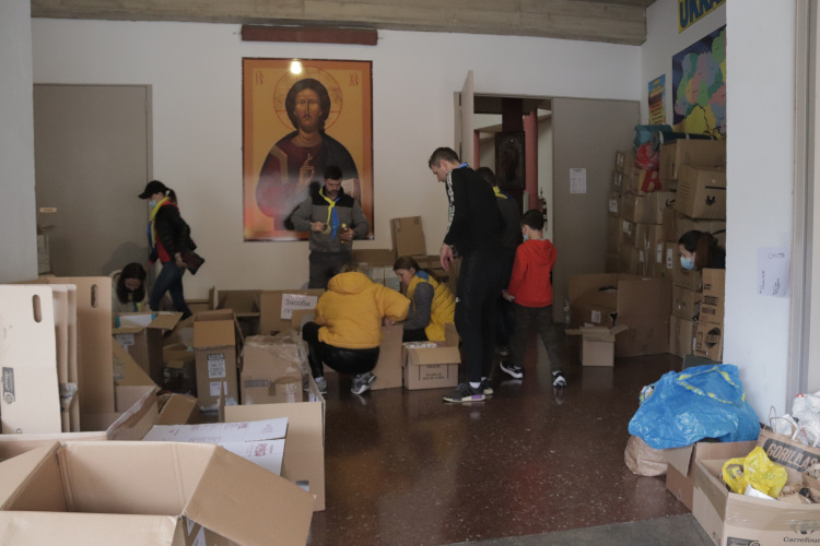 Several boxes containing humanitarian aid for Ukraine are stored in Barcelona's Greco-Catholic church, on February 28, 2022 (by Guifré Jordan)